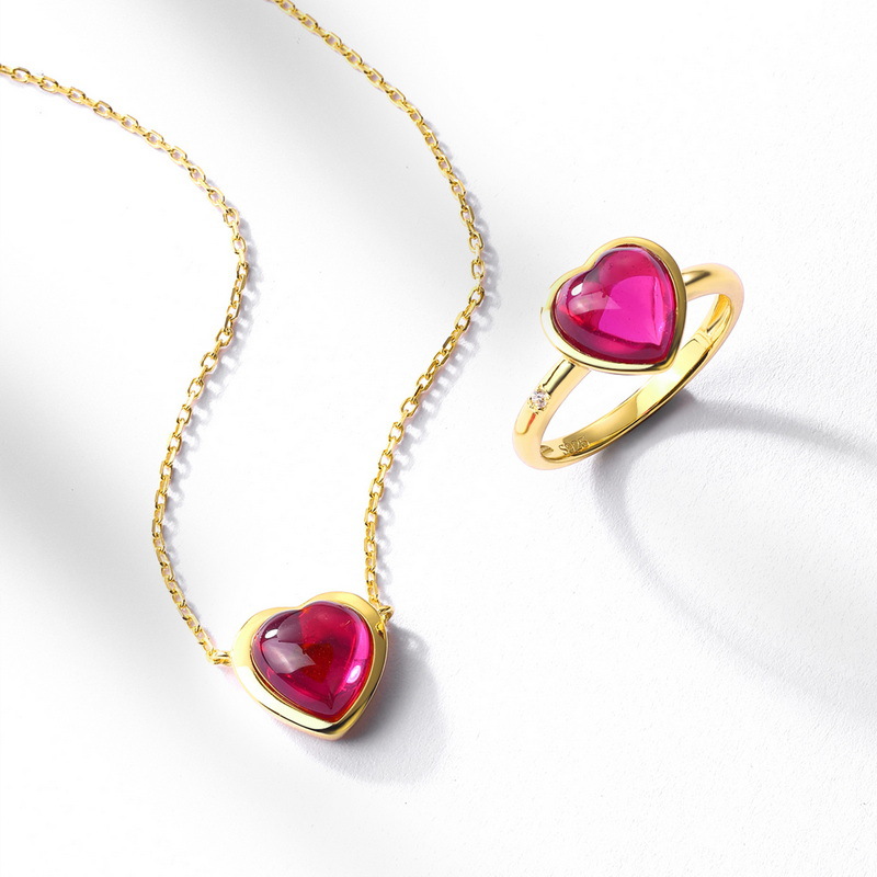 Anillo de tesoro de color de amor de caramelo transfronterizo femenino S925 plateado de 10K anillo de corindón rojo dorado simple y ligero