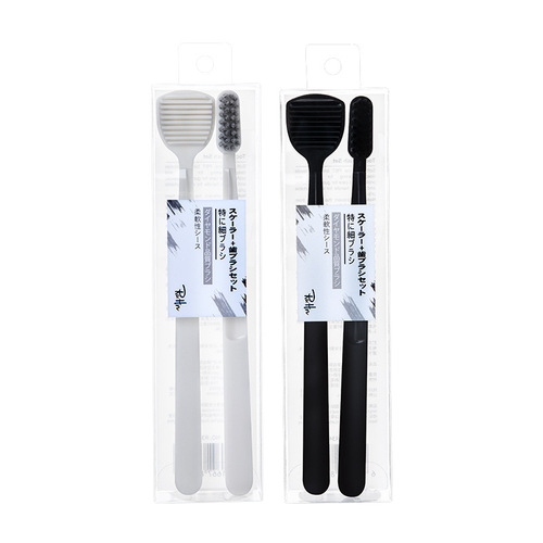 RAOYI new black and white spiral bristle toothbrush tongue scraping brush combination adult household soft bristle toothbrush manufacturer wholesale