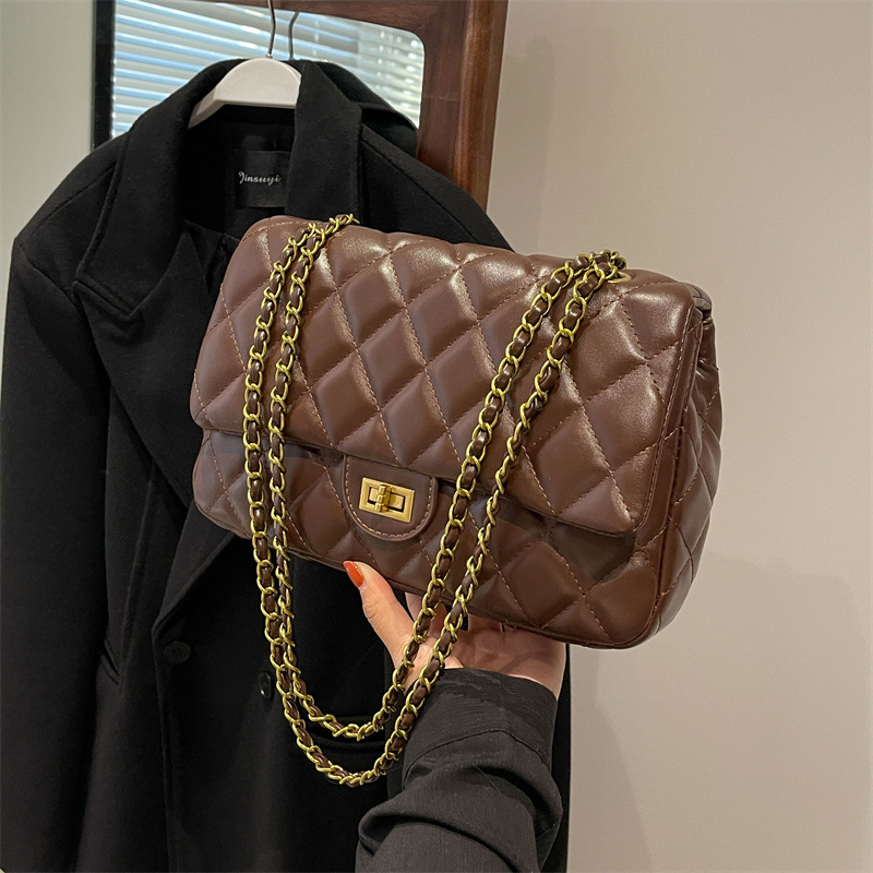 Sentido avanzado xiaoxiangfeng lingge Chain 2024 nuevos bolsos de color sólido mujeres soft Fashion 100 bolsos de hombro y axila