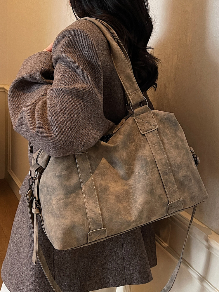 Bolsa de viaje corto de gran capacidad, bolso de mano, bolso de mano, mujer, 2025 nuevo invierno retro versátil, mochila de viaje