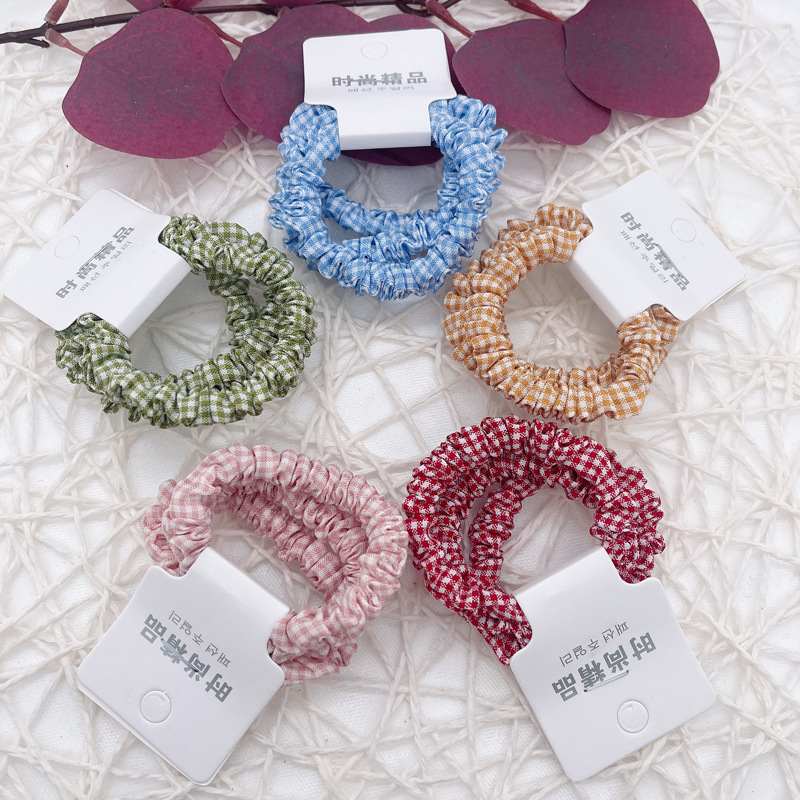 Dongdaemun estilo coreano hilo colorido accesorios para el cabello cuerda de pelo asequible banda de pelo de alta elasticidad de tres paquetes de banda de goma de dos yuanes tienda al por mayor image 12
