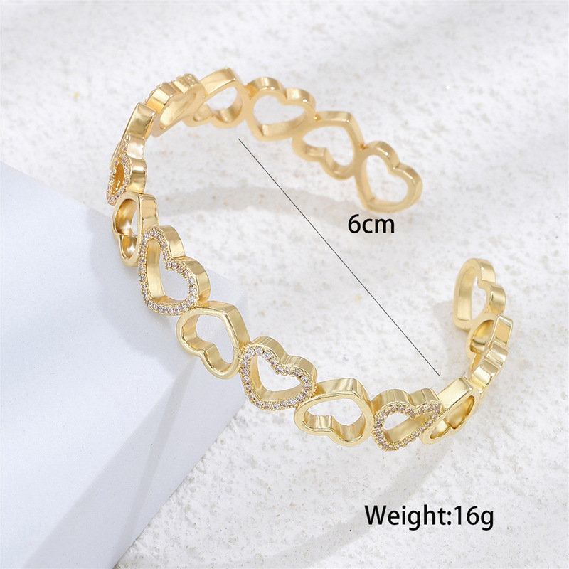 Aogu Cross-border Supply European And American New Gold Copper Micro Inlaid Zircon Bracelet Hollow Love Design Jewelry display picture 1