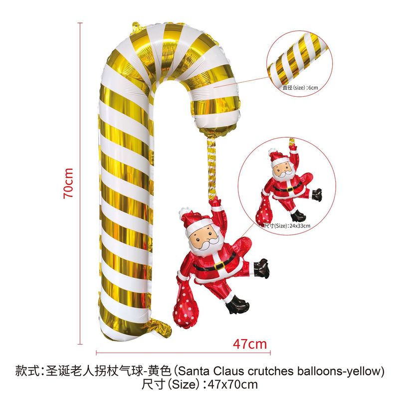 クリスマスのクリスマスツリーの老人雪だるまは棒のカチューシャの装飾品を持っています。|undefined