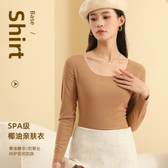 ココナッツオイルの底のシャツの女性のシンプルな純色の肌に合わせて、秋の服の丸首が痩せて見える上着の秋冬は美しい肌の服を着ることができます。