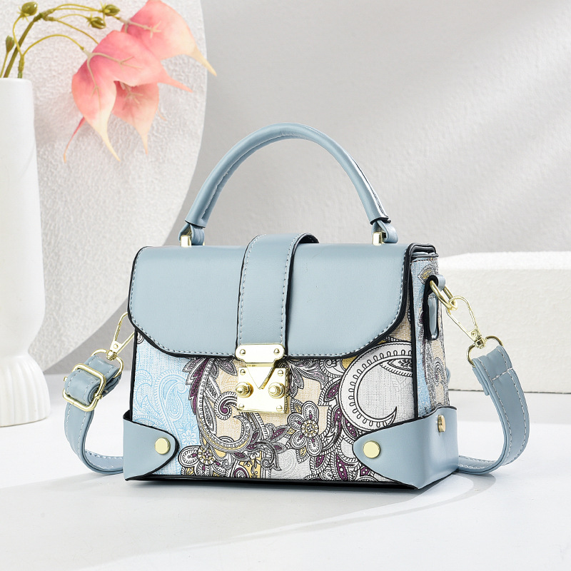 Bolso de mujer atmosférico de un solo hombro de moda de todo fósforo portátil nuevo patrón tejido fabricante bolso de mujer bolso de mensajero 2025