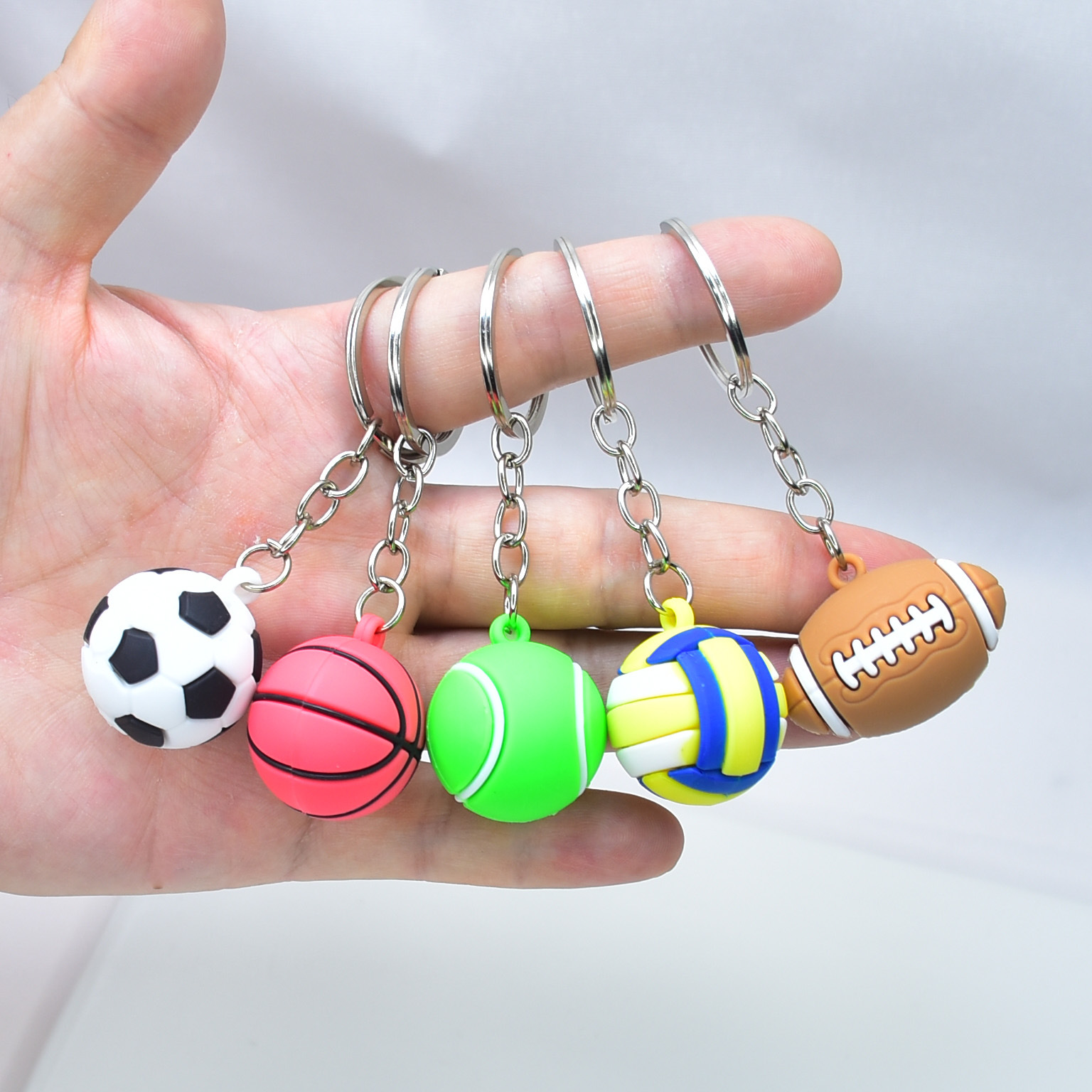Creative three-dimensional simulation soft rubber football basketball key chain rugby tennis backpack pendant opening gift