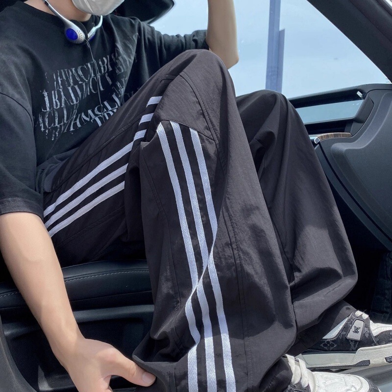 New Summer Quick-Dry Men's Sports Pants, Loose Straight-Leg Casual Versatile Ice Silk Men's Pants with a Light Luxury and High-End Feel New Summer Quick-Dry Men's Sports Pants, Loose Straight-Leg Casual Versatile Ice Silk Men's Pants with a Light Luxury and High-End Feel