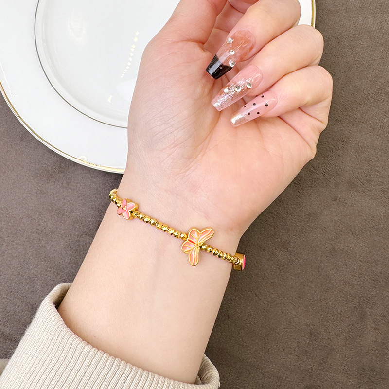 Pulseras de oro antiguo transfronterizas retro goteo de aceite polvo de sueño mariposa pulseras ligeras lujosas no se desvanecen joyas al por mayor