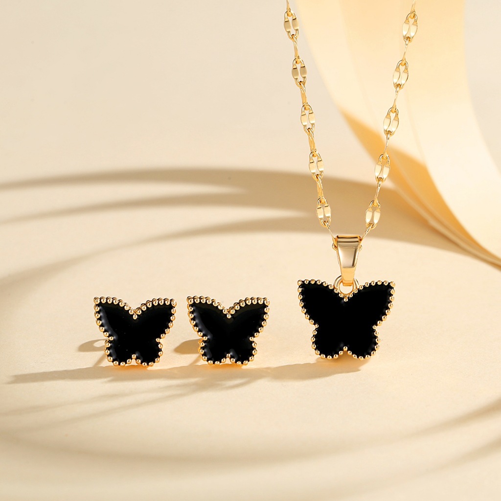 Europa y los Estados Unidos explotaron mariposa juegos de joyería de cobre dorado para mujeres pendientes de aceite goteo collar de seis colores joyerías transfronterizas en caliente
