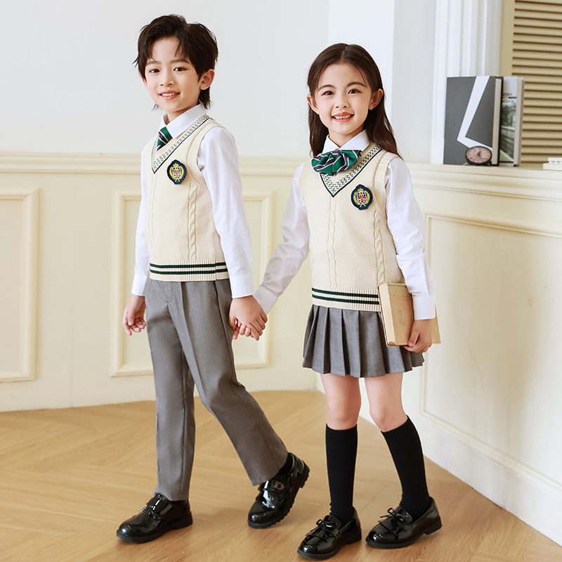 Uniforme escolar para estudiantes de primaria traje de primavera y otoño ropa deportiva de clase para niños primavera y verano jardín de infantes de cuatro piezas Ropa de jardín otoño algodón puro