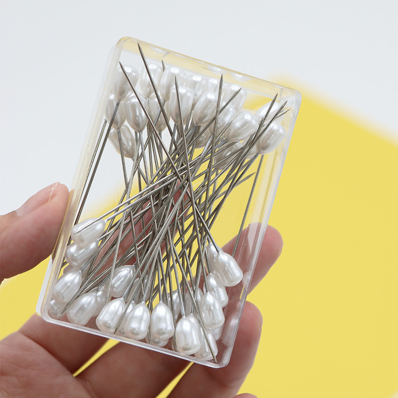Agujas de goteo redondas de agua agujas blancas de posicionamiento de ropa de corte flores de boda fijas agujas de perlas 100