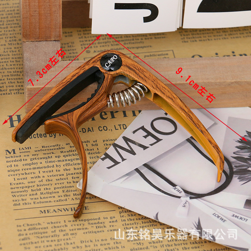 Guitarra Capo aleación de zinc Capo guitarra folk de doble propósito de afinación guitarra eléctrica fábrica al por mayor accesorios para instrumentos musicales