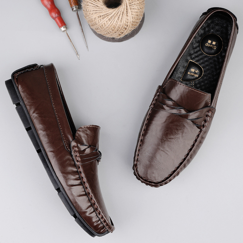 Zapatos de hombre de cuero real 2025 nuevos zapatos de negocios británicos transpirables con suela suave zapatos casuales perezosos con un pie zapatos para hombre