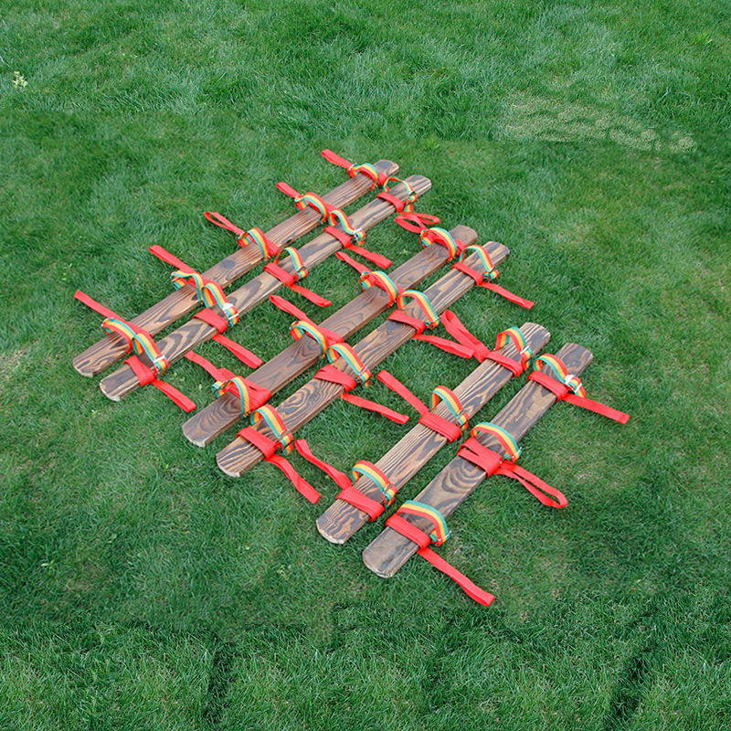 Fun sports meet props: Wooden plank shoes for teamwork, land dragon boat race, giant footprints, and giant footboard.