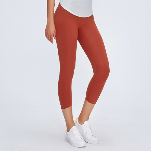 A new model of brushed nude-feeling yoga pants with no embarrassing lines, hip-raising high-waisted running sports fitness cropped pants