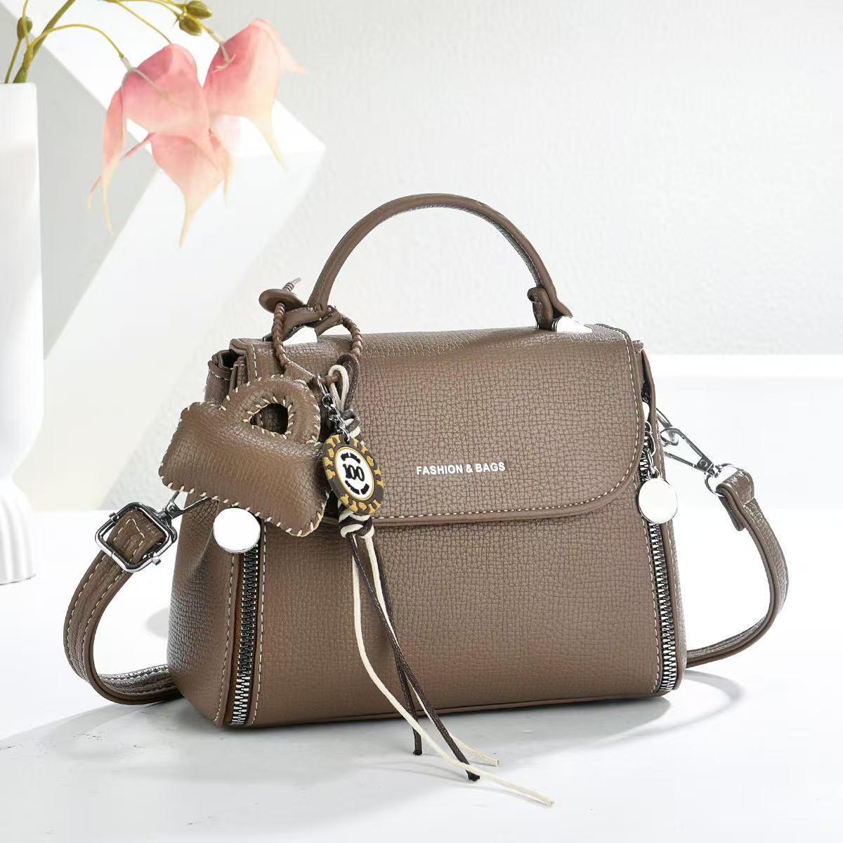 Bolsas de textura universal bolsas de mano colgantes bolsas de mano de transporte diario bolsas de hombro de moda casuales bolsas transfronterizas