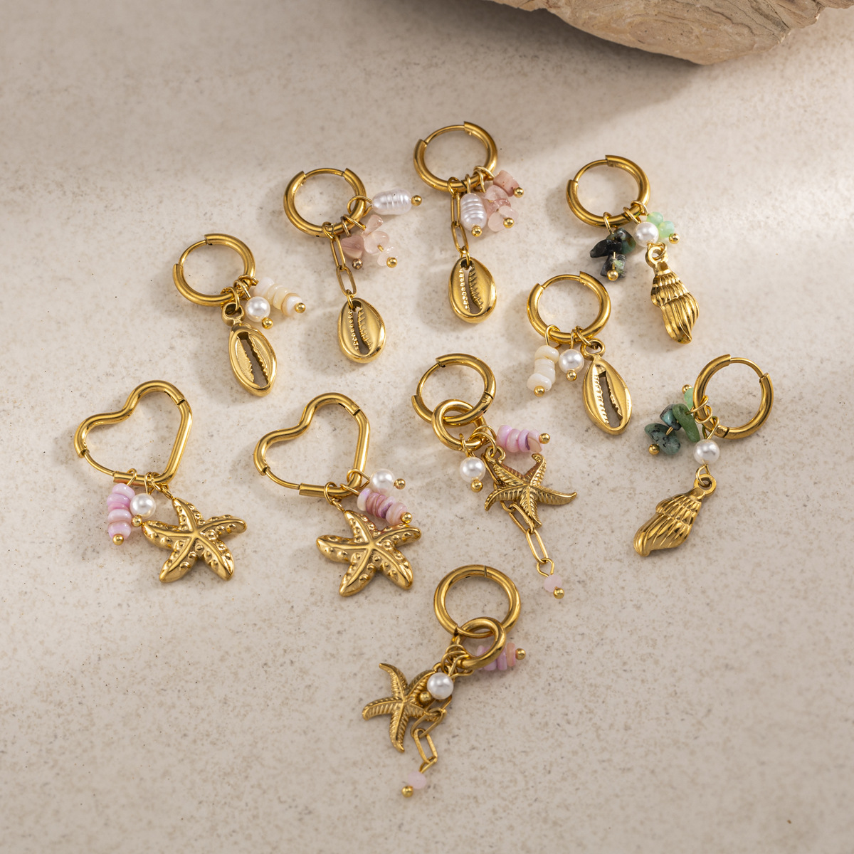 Taena Cross-border Ocean Fashion Orejas de todo fósforo Pendientes de estrella de mar de acero inoxidable de oro de 18K Pendientes de diseño retro