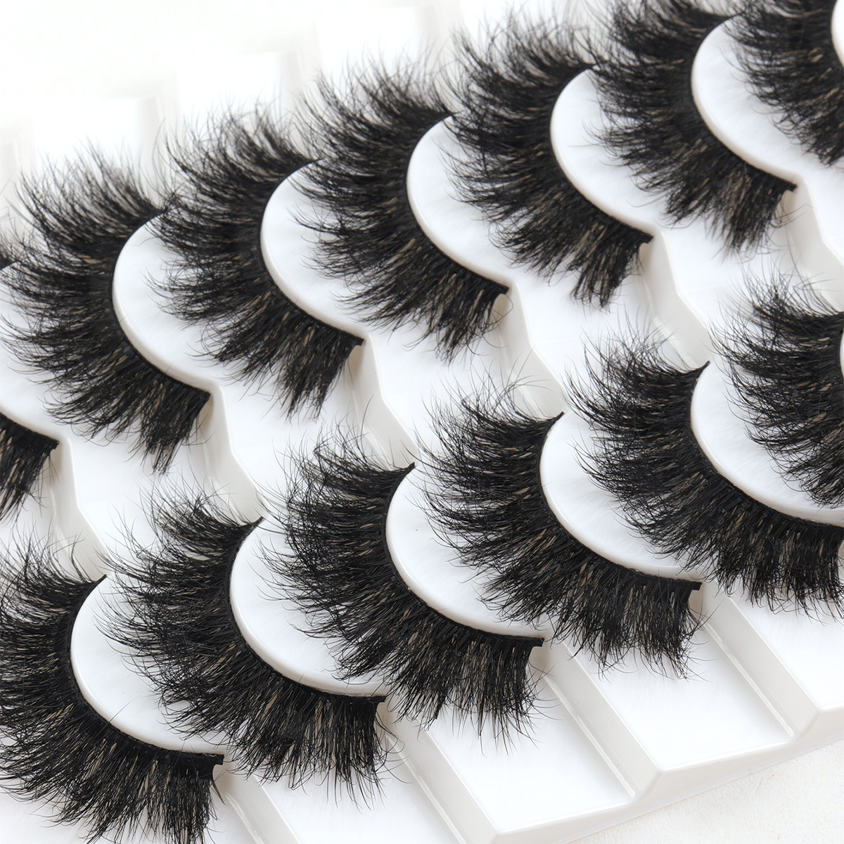 Europa y los Estados Unidos de comercio exterior venta caliente pestañas fritas pestañas falsas pestañas densas estereoscópicas al por mayor pestañas siete pares de pestañas