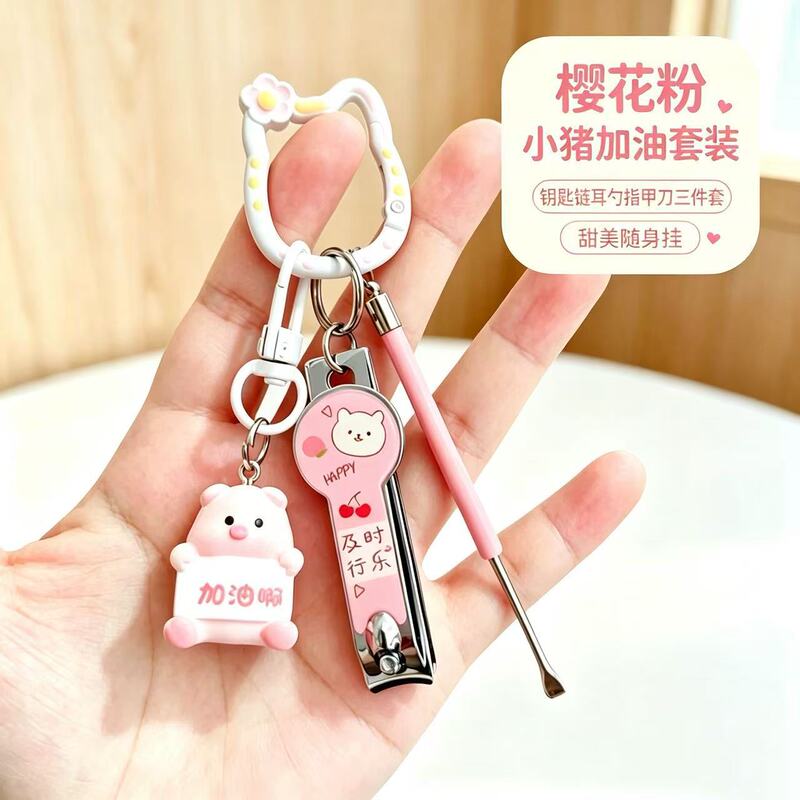 Wholesale cute bear keychain, nail clippers, ear pick pendant, student girl's kitty nail clipper keychain