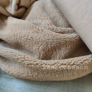 批发定做羊羔毛颗粒绒卷曲泰迪麦穗绒面料家纺服装箱包鞋帽面料