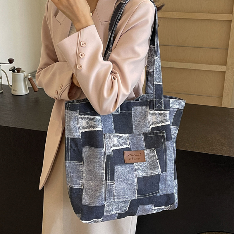 Bolso de mezclilla de gran capacidad para mujer 2024 nuevo bolso de hombro de color de contraste de moda bolso de viajero casual de todo fósforo de moda