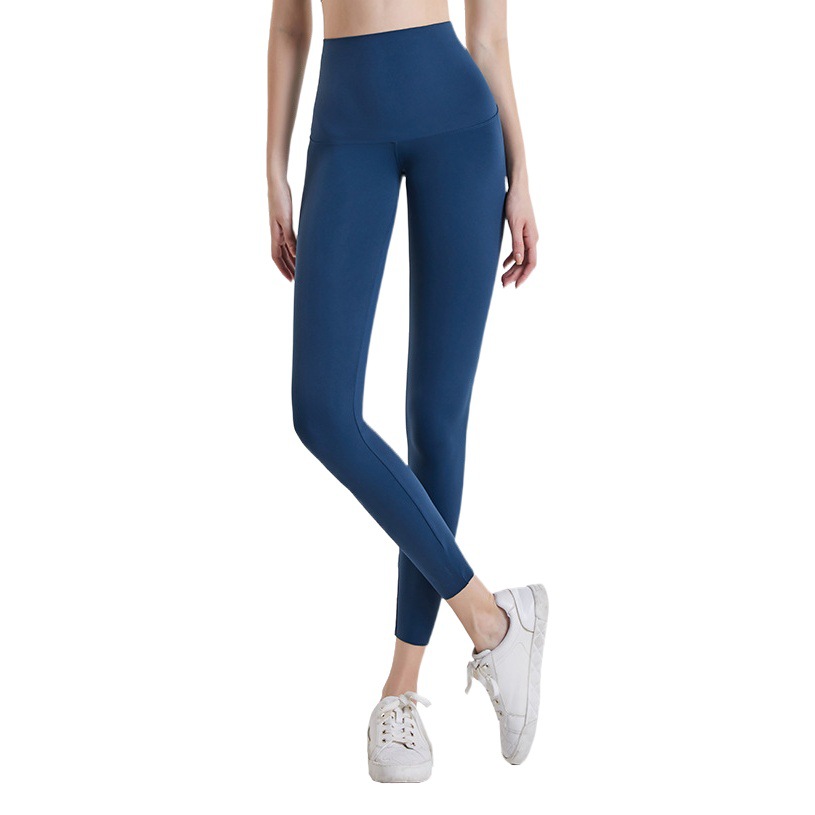 Primavera y verano nuevo yoga Barbie Pantalones de mujer de cintura alta estiramiento de una pieza medias deportivas desgaste exterior bottoming pantalones recortados