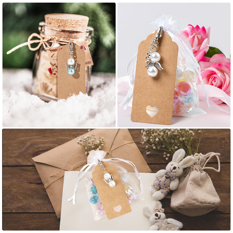 Venta caliente transfronteriza Llavero Trébol de cuatro hojas Estilo de moda etiqueta de regalo de mano Juego de caja de regalo de fiesta de boda