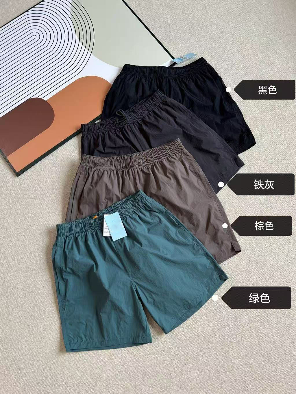 2025 verano nuevo co-marcado para hombres y mujeres transfronterizos pantalones cortos deportivos de tejido 8194