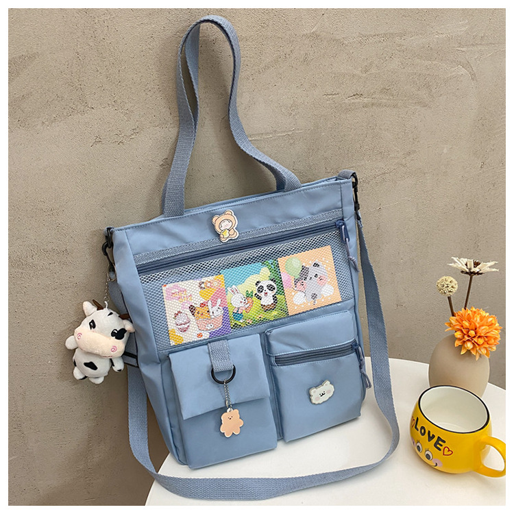 Large-capacity Japanese-style single-shoulder canvas bag for girls, versatile crossbody, ins, a tote bag for junior high school students' classes, and a schoolbag for after-school tutoring undefined