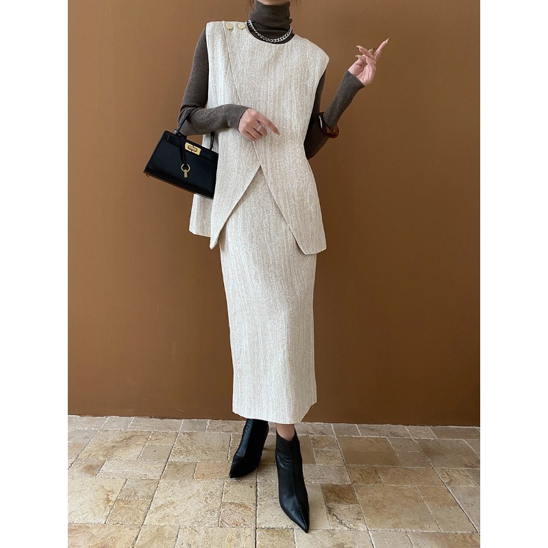 司南高智感通勤天丝麻肌理感不规则马甲半身裙两件套装