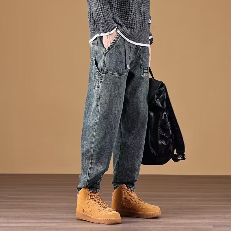 Estilo de Hong Kong hombres de moda verano nuevo estilo 2024 personalidad alfabeto jeans hip-hop ins marea calle alta tendencia pantalones guapos