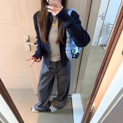 長袖の高襟のニットのカーディガンの上着の女性の春秋の新型のチベットの青の修身の短いタイプの立襟のファスナーのセーターのコート