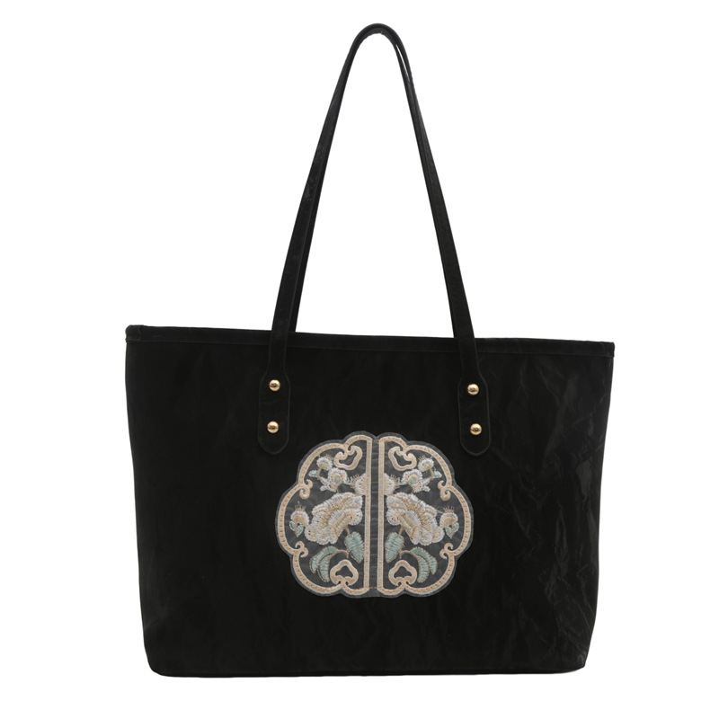 Bolsa de mano de alta calidad de alta capacidad de textura de transporte de verano 2024 nuevo estilo versátil para trabajar bolsas de hombro