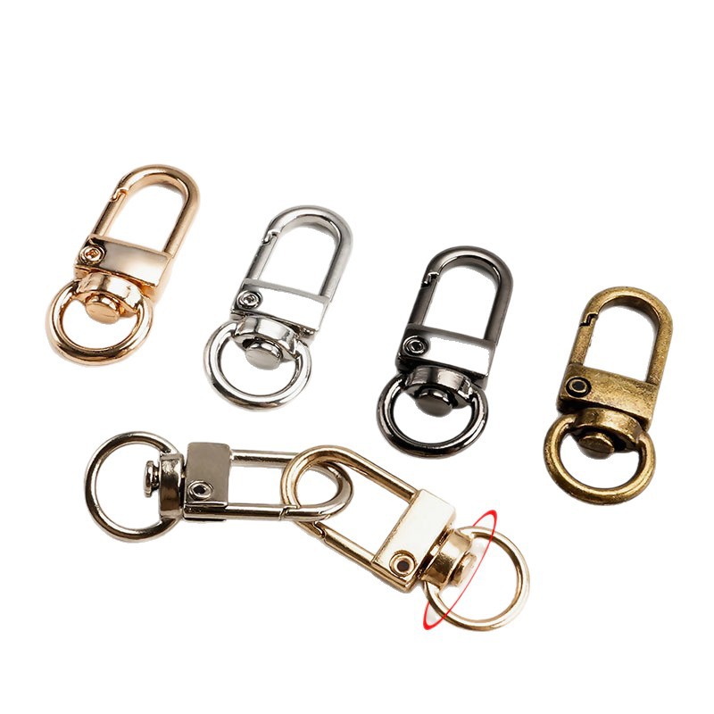 Aleación de zinc giratoria llavero accesorios DIY accesorios multicolor opcional 32mm bolsos universales hebilla al por mayor