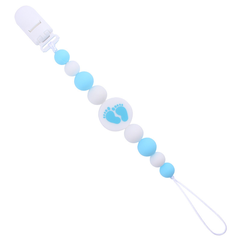 Nuevo bebé suministros de dibujos animados de impresión redonda amor creativo DIY silicona mordedura molar pezón cadena anti-caída