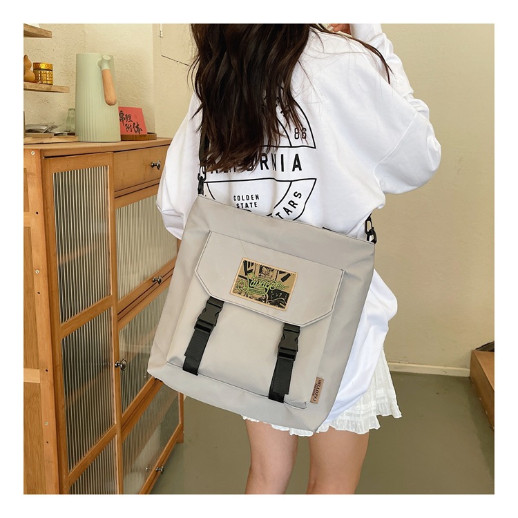 도매 새로운 대용량 학생 메이크업 가방 패션 질감 어깨 메신저 가방 쇼핑 가방 토트 가방 크로스 테두리