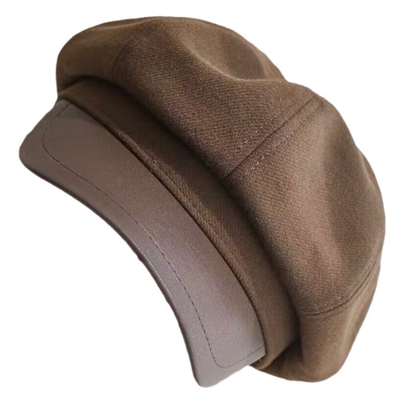 韓国の百合ベレー帽の女性は秋冬に顔を見せます。