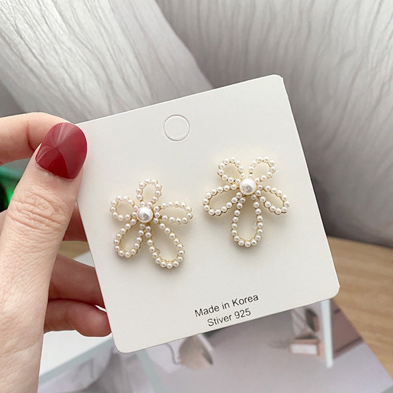 Wholesale Jewelry Hollow Flower Diamond Pearl Earrings Nihaojewelry display picture 4