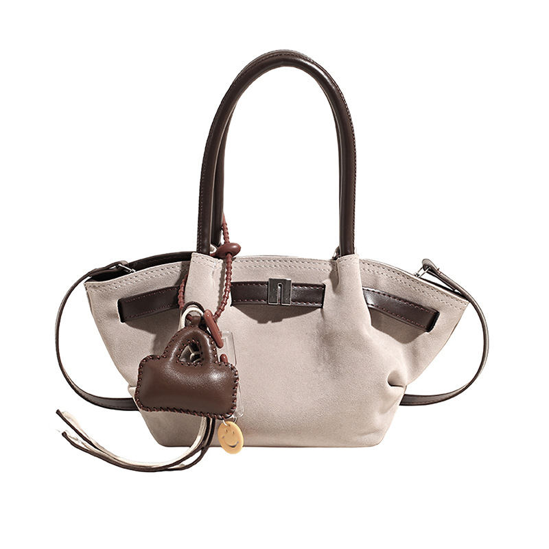 Cestas de platos de mano bolsas de cubo mujeres 2025 nuevo cross-border europeo y americano retro mochila de piel de ciervo esmaltado