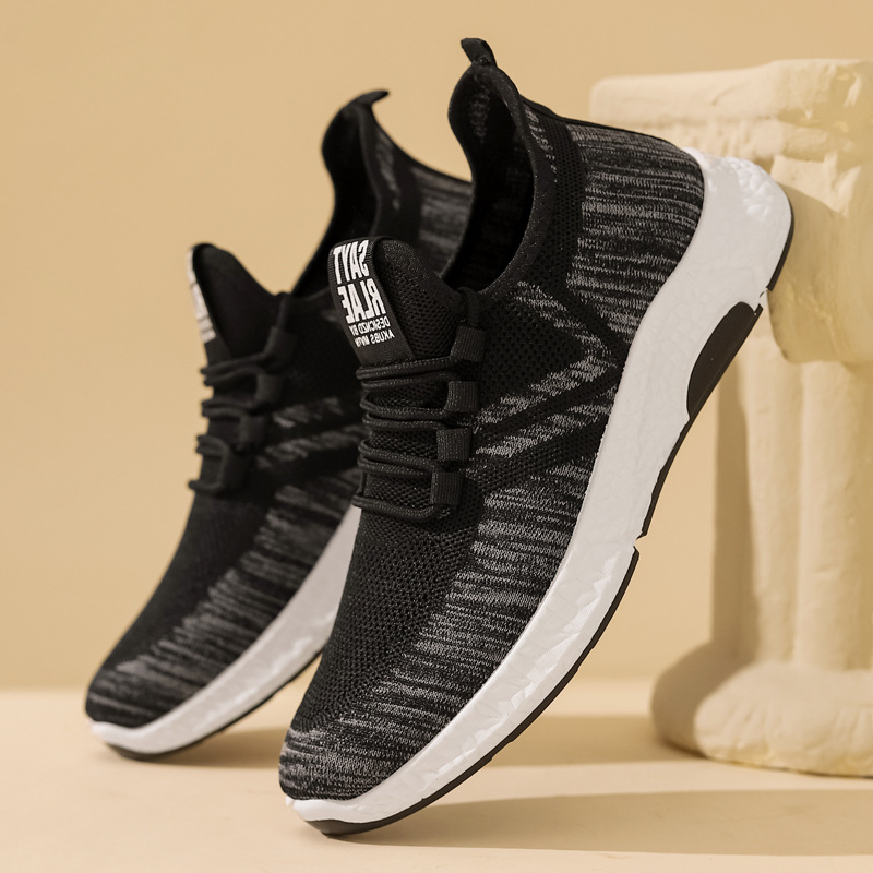 Zapatos otoño nuevo comercio exterior transfronterizo zapatos de hombre volando tejido transpirable casual ligero zapatilla de deporte de los hombres fábrica de moda al por mayor