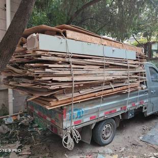 Beijing Stair-Climbing Waste Recycling Workers Dismantle Old Furniture, Recycle Wood, and Clean up Garbage Waste
