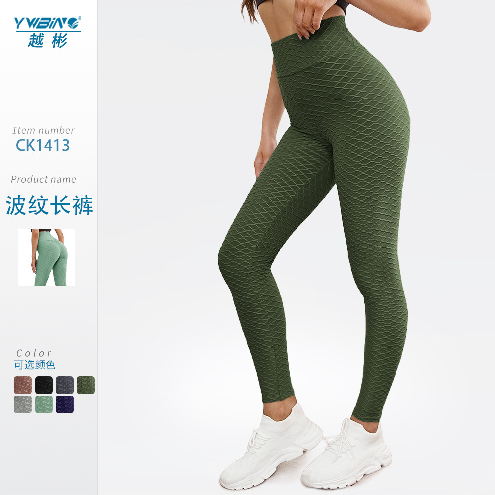 ¡En stock! Europa y América popular melocotón hip lifting onda patrón jacquard yoga burbuja pantalones de cintura alta medias deportivas para las mujeres
