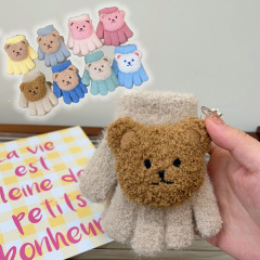 アニメのぬいぐるみの子供の手袋は冬に暖かくて、韓国版のかわいい熊の幼稚園の赤ちゃんが字を書いています。
