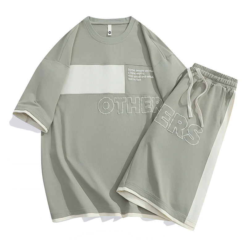 Tren de verano Traje deportivo casual suelto para hombre Camiseta de manga corta Traje de dos piezas para jóvenes estadounidenses