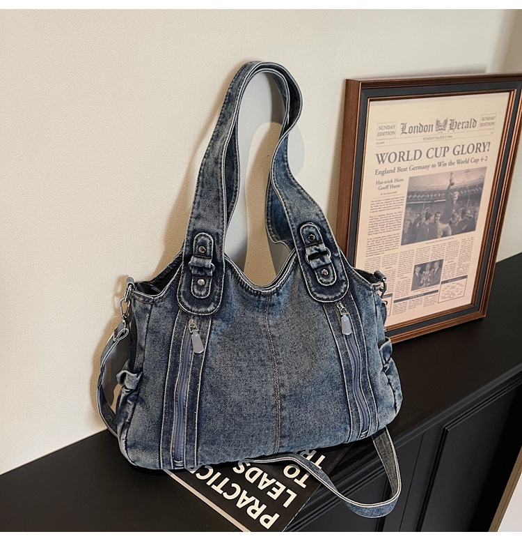 Bolsas de tendencia transfronteriza de gran capacidad para mujeres 2026 primavera nuevo retro jeans mochila de viaje simple tote