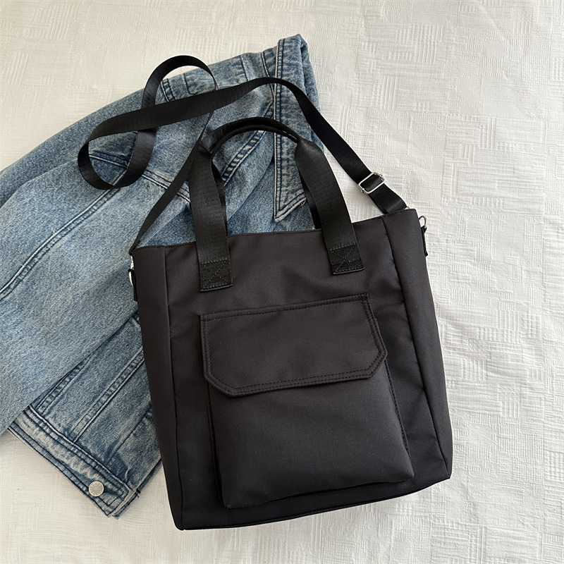 Corea del estilo de transporte universal lona multi-bolsillo TOT estudiantes de arte ocio simple 2025 bolso de hombro portátil
