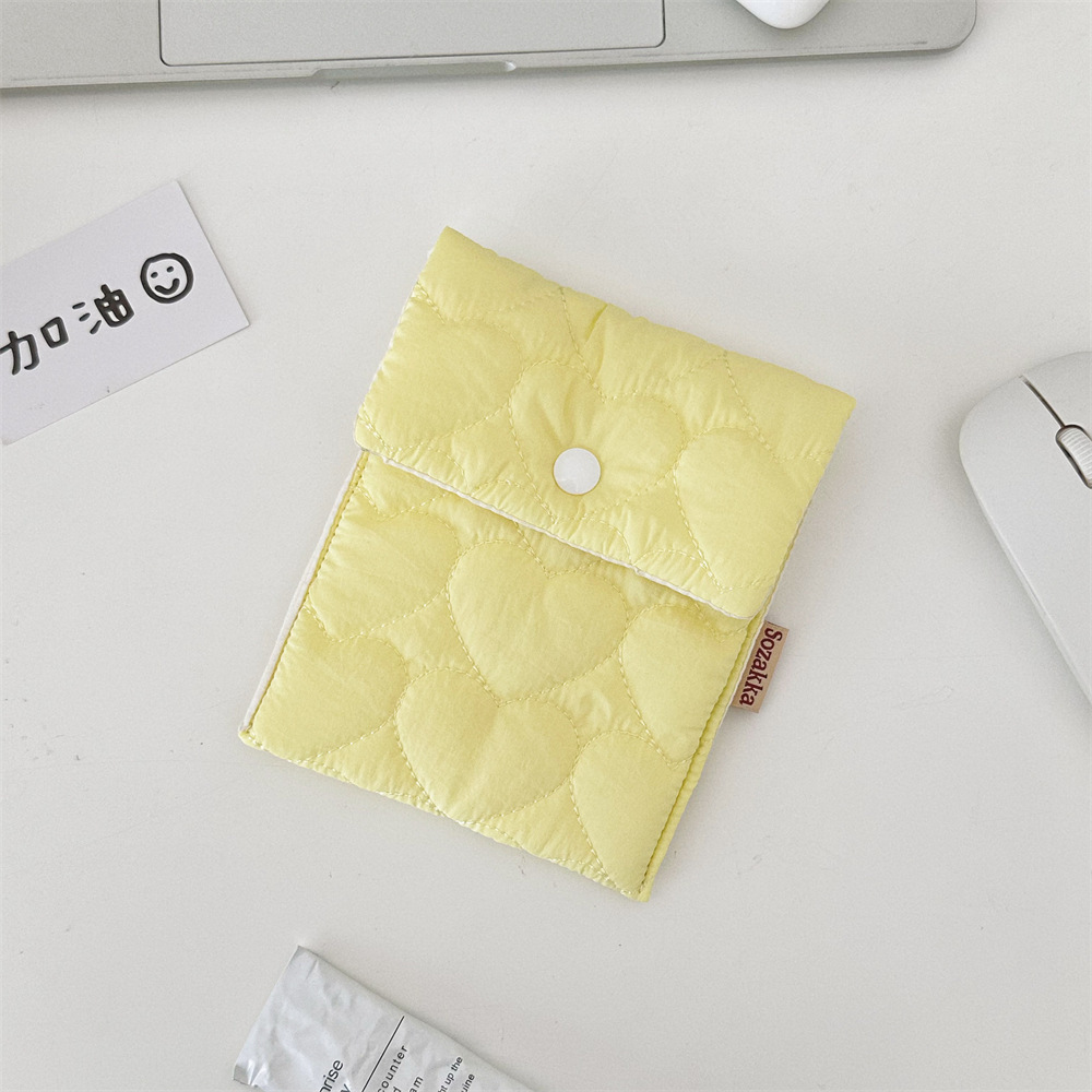 Heart-shaped yellow hygiene kit