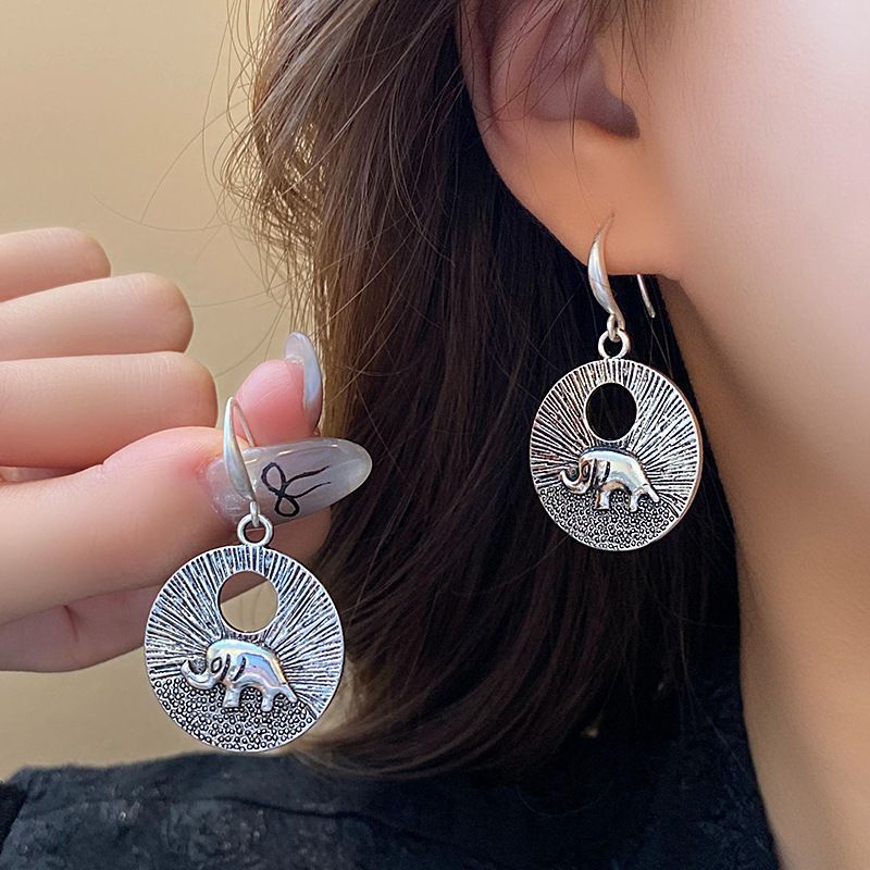 Aguja de plata Nuevos pendientes en forma de abanico de bambú de estilo chino Pendientes de mariposa de gota de agua de moda nacional Pendientes retro de todo fósforo Pendientes mujer