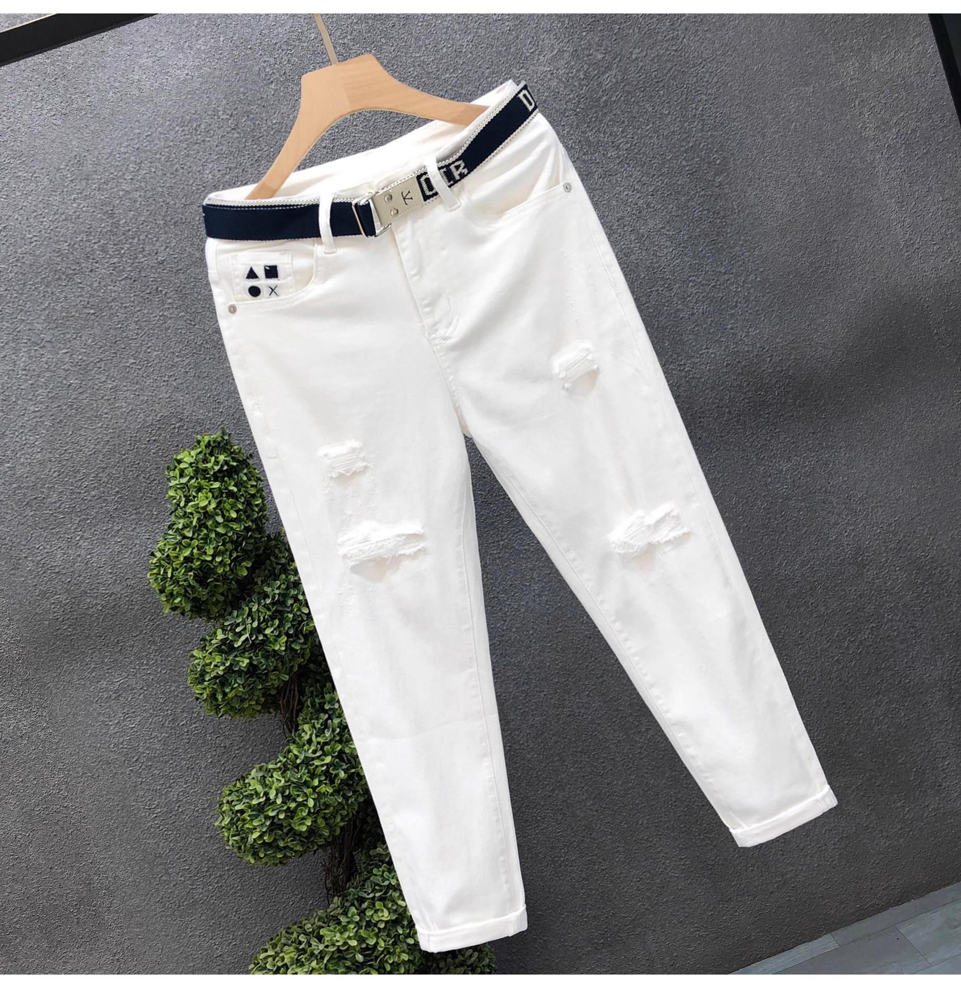 Jeans slim fit uomo denim strappato alla moda per l'estate_voghion.com