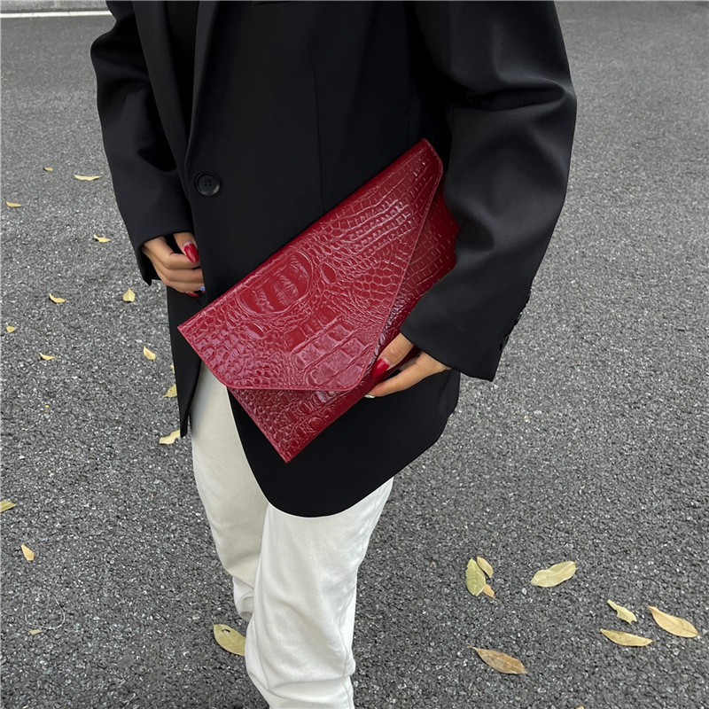 Moda de color sólido alta textura bolsa de cena de mujer nuevo otoño cocodrilo temperamento casual bolsa de mano versátil